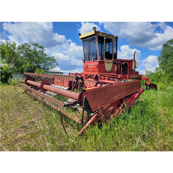 Versatile swather. Approx 21ft. As is, not running.
