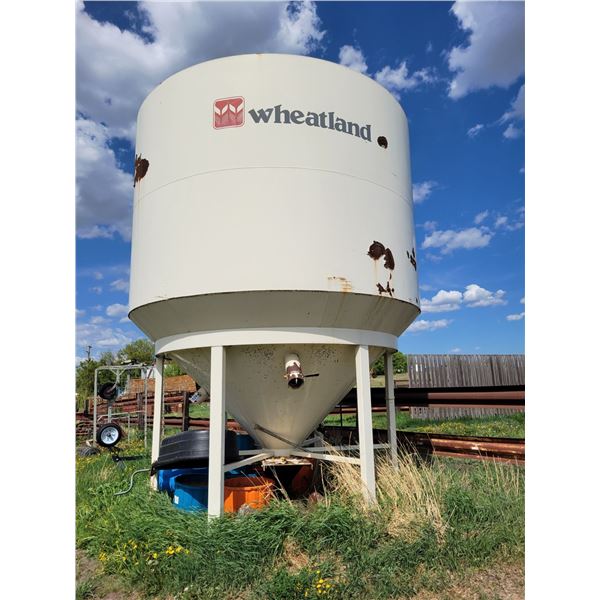 Wheatland 2 ring hopper bin. Bottom on skid. 3 pail spouts.