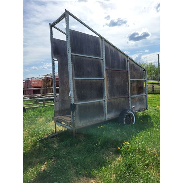 12ft mobile loading chute. 39" wide, frame is good. Needs new wood.
