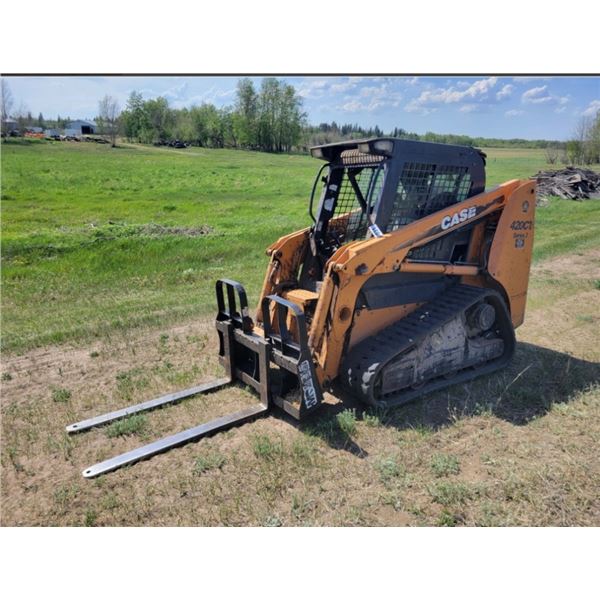 Case 420 CT track skid steer series 3, enclosed cab, aux hyds, approx. 1250 hrs. C/w manuals.
