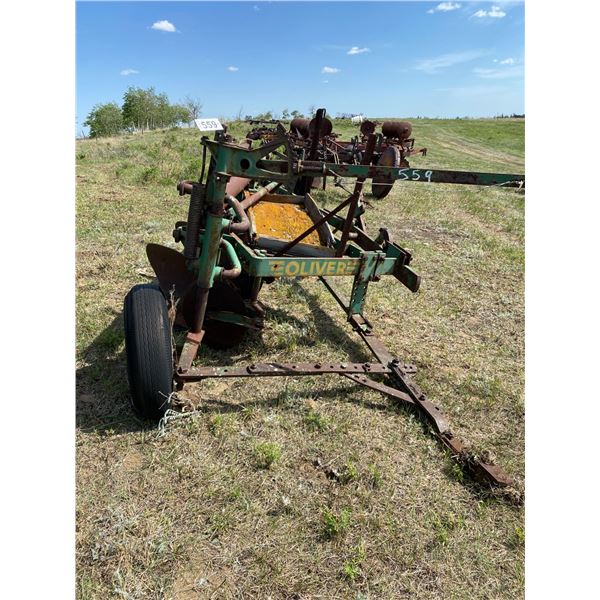 Oliver 5 bottom plow complete with colters. Missing a tire.