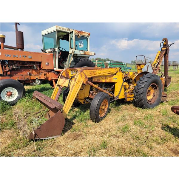 202 Massey back hoe. New rear tires(Graden).  Not running. As is.