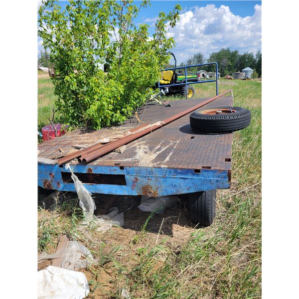 Steel deck bale trailer. Approx 8 x 16ft, front spindle broke.