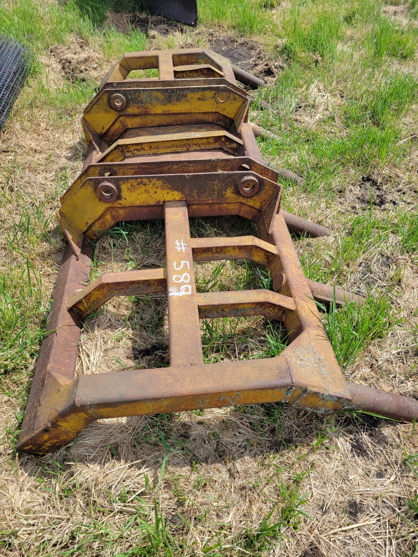 Brush rake cat loader.