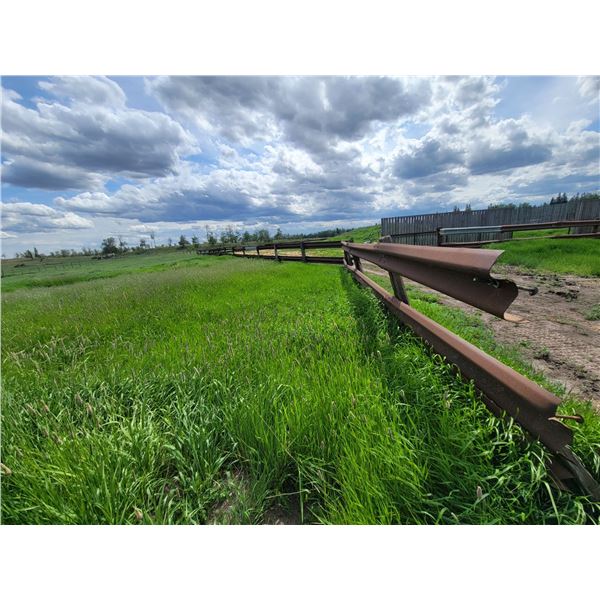 Approx 15 sections of guard rail fence (east side of corral, north to south). Buyer to dismantle and