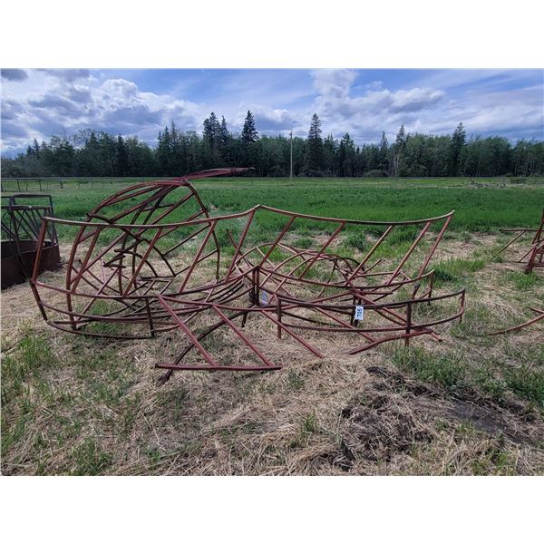 1 round bale feeder needing repair.