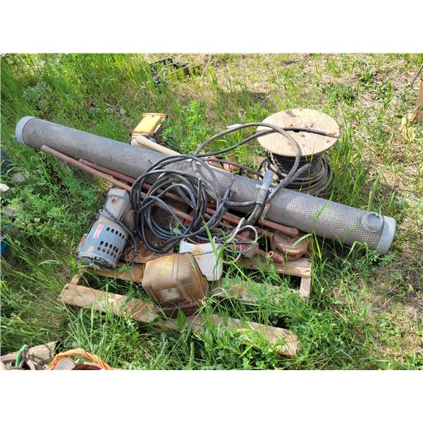 Cattle oiler, dehorner, handles, roll of  elec. wire.