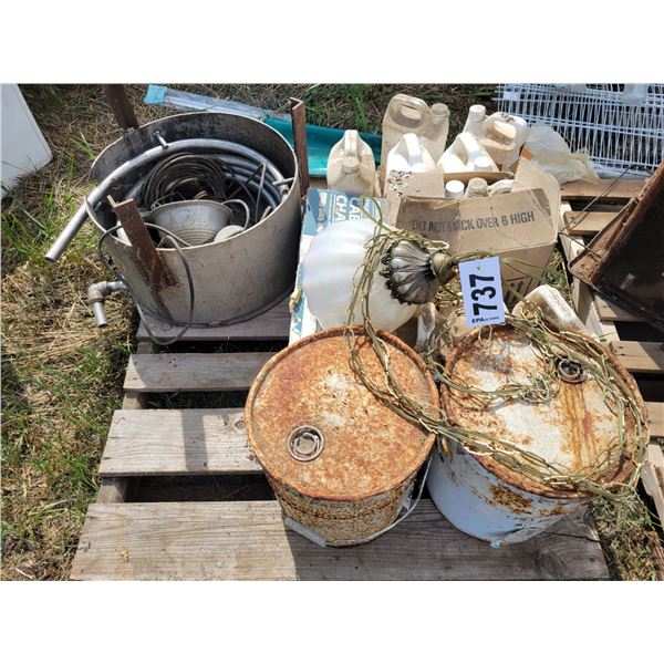 Assorted paints, varsol, cable tire chains, water boiler.