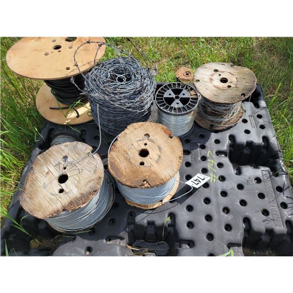 Various rolls of barb wire, and straight wire.  New .