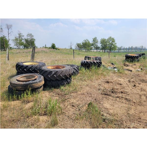 Assorted truck and tractor tires and rims. Various sizes.