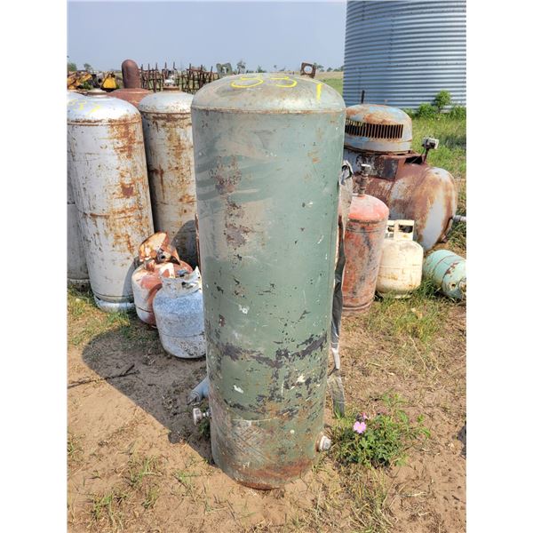 Various propane and air tanks.