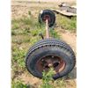 Image 1 : Single trailer axle. 74" between springs. Tires hold air.
