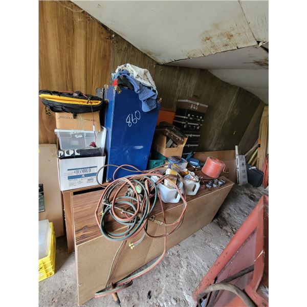 2 cabinets, 2 trunks, 8 brief cases of records & a tracks, torch, roll of twine etc