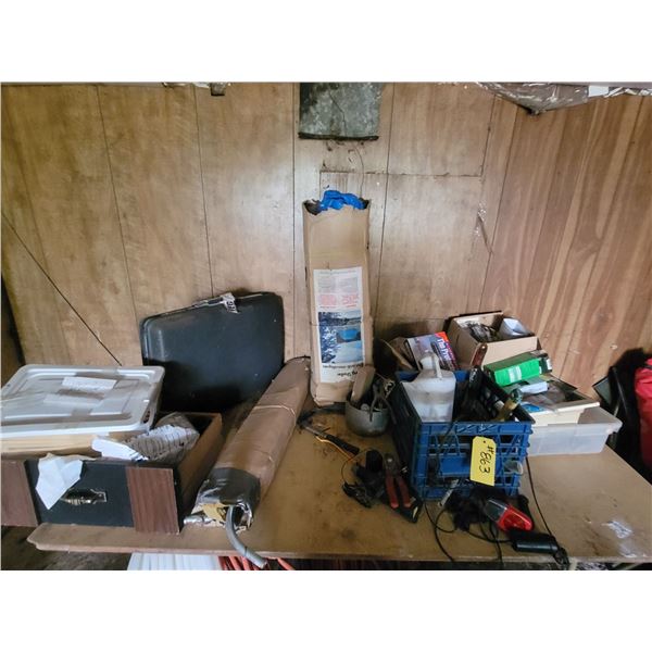 Table and contents (on top of table) including various vet supplies, dining shelter, hardware,meat h