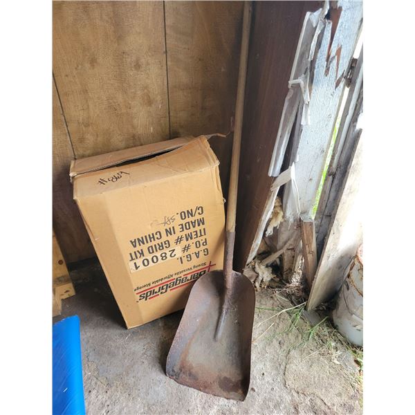 Metal shovel, and garage storage rack.