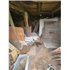 Image 3 : Contents of wood building including  plywood, windows, barrels and misc outside front of building