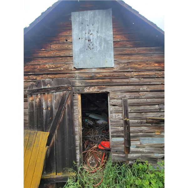 Content of wood building . Hoses, hyd lines, tank, seats etc.