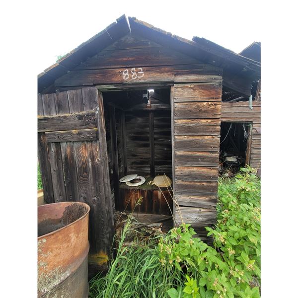 Rustic wooden outhouse. Multiple seats. Buyer to load out.