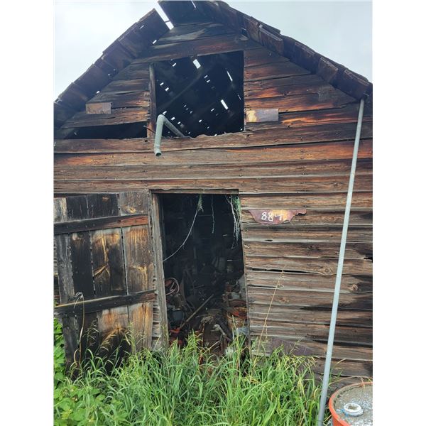 Contents of wood building. Qty  of scrap metal.