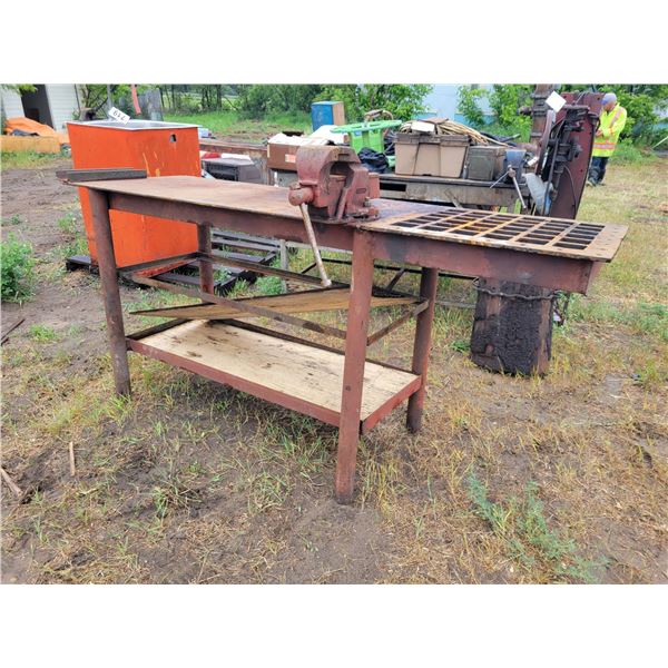 Metal table w/vice.Approx  70" x 22" x 36".