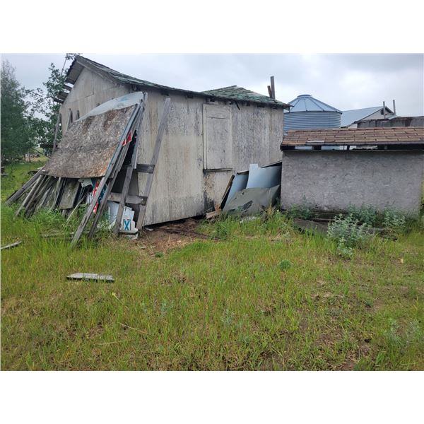 Qty  of signs of various sizes, lumber, and large wooden dog house. Buyer to load out.