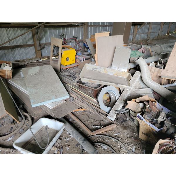 Contents of building including dunnage, lumber, bike, scrap steel and misc.