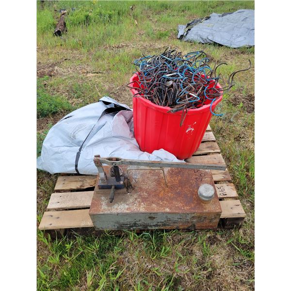 Hand pump, tarp and misc hay tarp anchors.