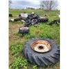 Image 1 : Large Qty  of scrap metal, tires on rims, trailer, barrels, track machine etc. Buyer to load out.