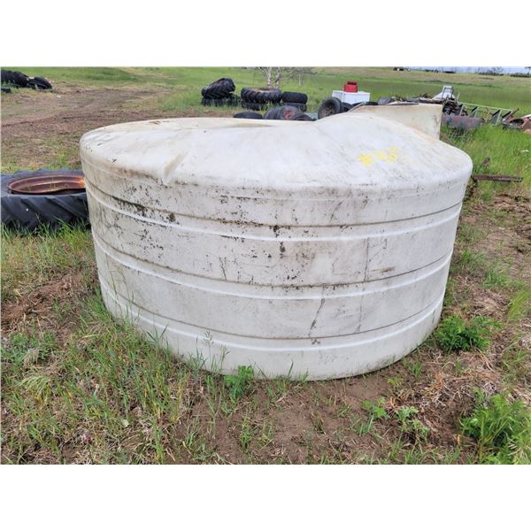 1200 gallon poly water tank. Visible hole near top.