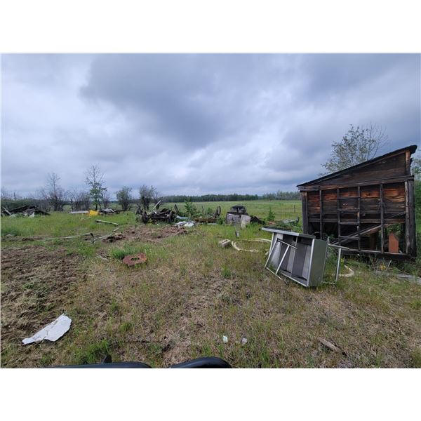 Stainless steel double sink, hot seat boiler, bricks, cable, trailer, wood building and misc. Buyer