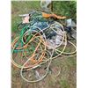 Image 6 : Pail of Powdered pressure washer soap, tomato cages, shovel, broom, jerry cans and misc.