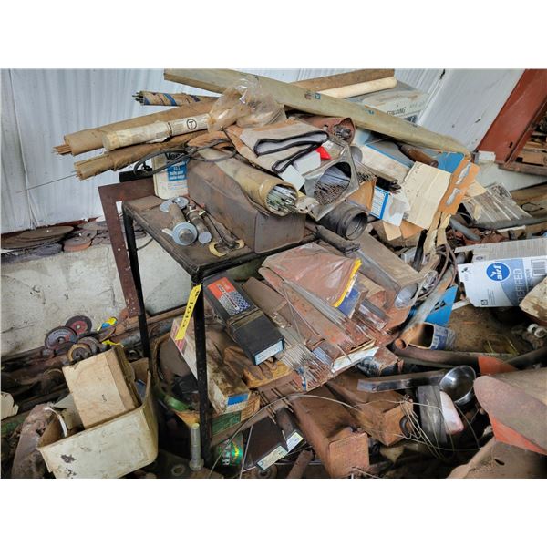 Qty  of welding rods, table, and bench.