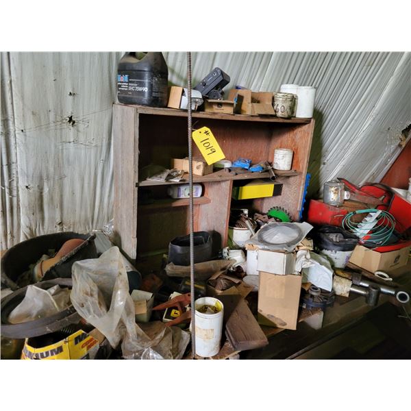 North wall of shop contents. 563 loader cyclinder, parts, supplies and misc.