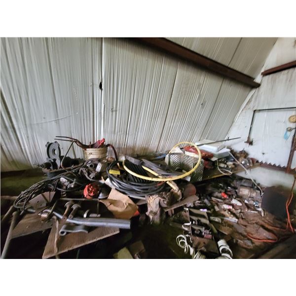 Table w/ 2 sets of rotary mower blades.