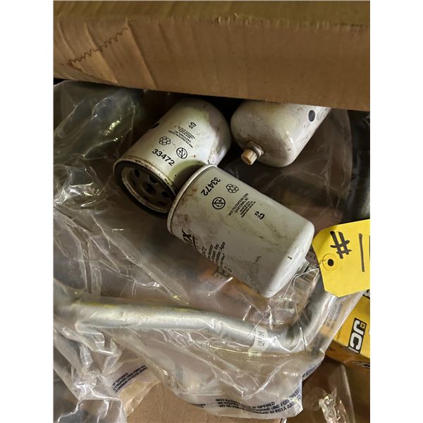 Qty  of tractor parts, filters, bale buster axle (complete) and misc .