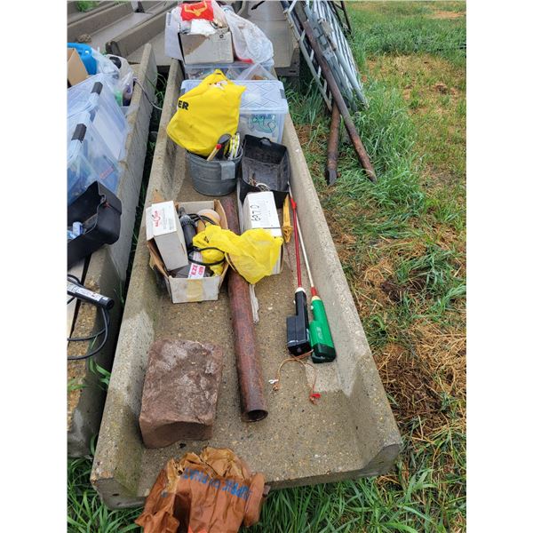 Assorted cattle supplies, Cider implants, lube, ear tag guns, cattle prods, and misc.