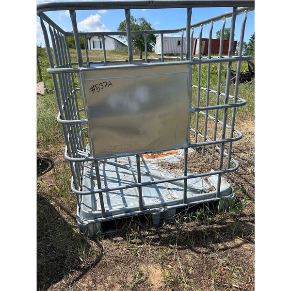 Steel cage, and 2 totes in cages.