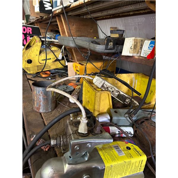 Contents of south wall.  All content on shelves, and floor. Washers, bolts, wrenches, grease, tools