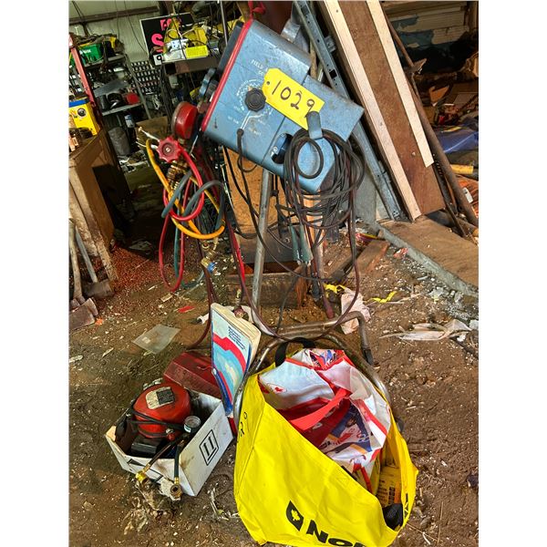 Sun electric volt amp tester. A/c pump, gauges. Approx 24 cans of a/c .