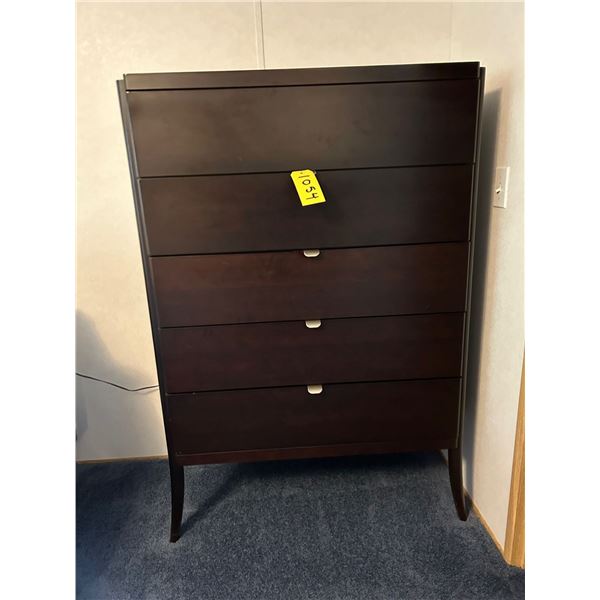 Queen bed c/w drawers under bed, dressers, closets. No contents included. Buyer to load out.