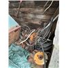 Image 5 : Contents of wooden building. Halters, stock heaters, tires, copper cable, cat rollers, furnace etc.