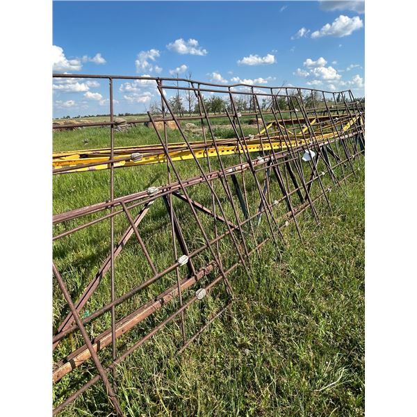 Misc sucker rod panels , calf shed frame ,2 bale feeders , approx 16 foot mesh wire panels.
