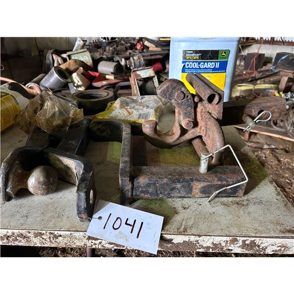 Assorted hitches , chain, extension cords , table, misc .