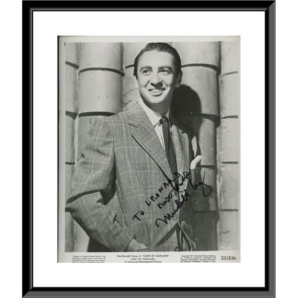MacDonald Carey signed "Cave of Outlaws" movie photo