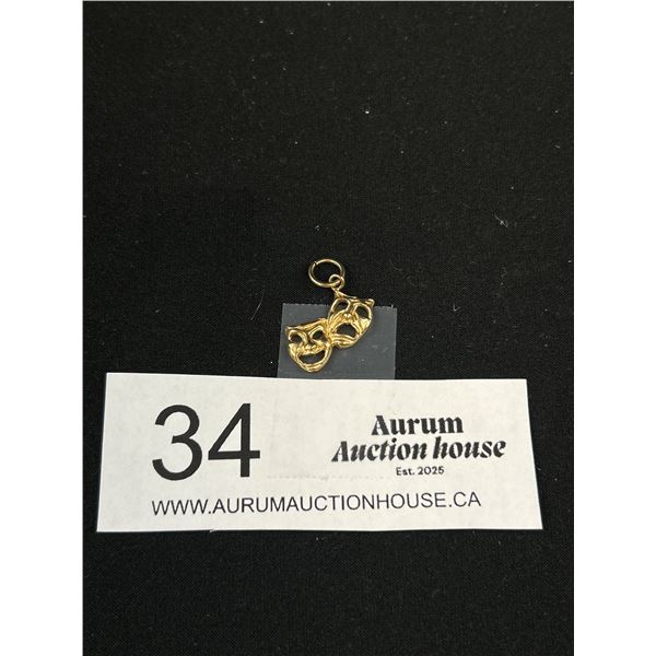 1.1 gr 10KT Gold Drama Masks Pendant