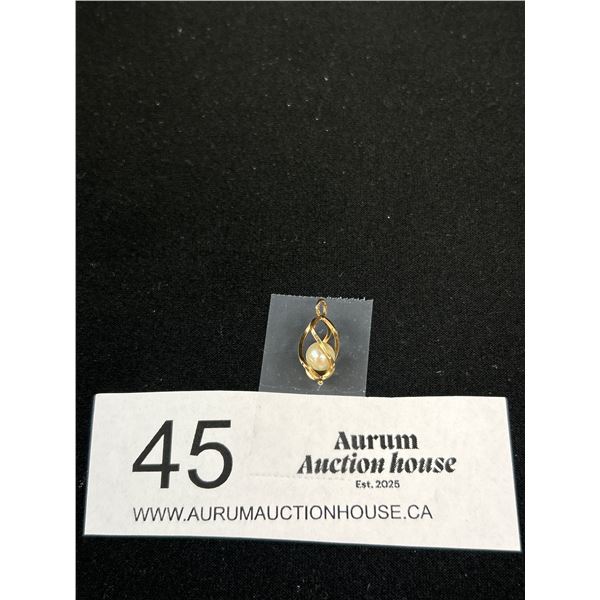 Pretty 10k Gold Pendant w/ Pearl Inside