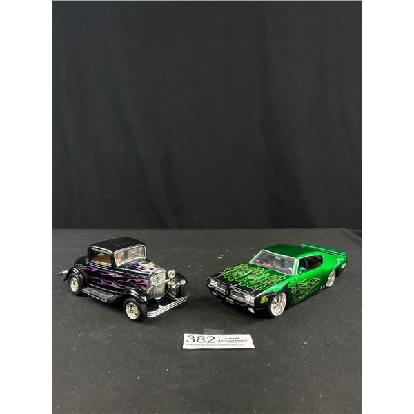 2 1/24th Scale Diecast Cars