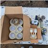 Image 1 : Tape, tape rollers, and paint brushes