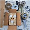 Image 2 : Tape, tape rollers, and paint brushes