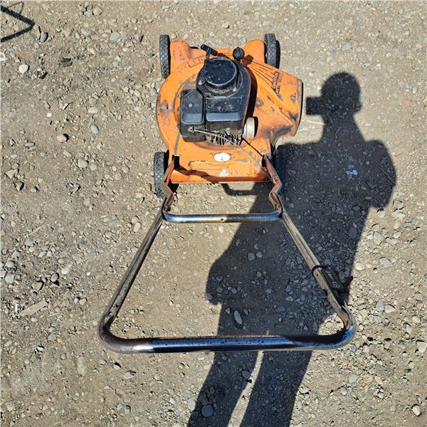 Orange mastercraft lawn mower